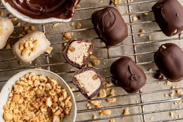 snickers dipped cheesecake bites